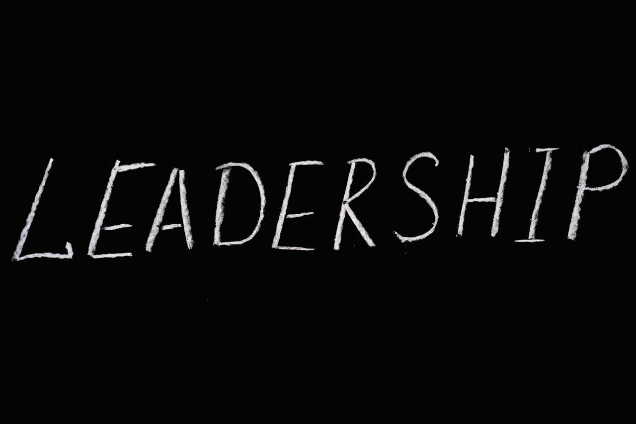 services-03 Chalk text spelling 'Leadership' on a blackboard, symbolizing guidance and authority.